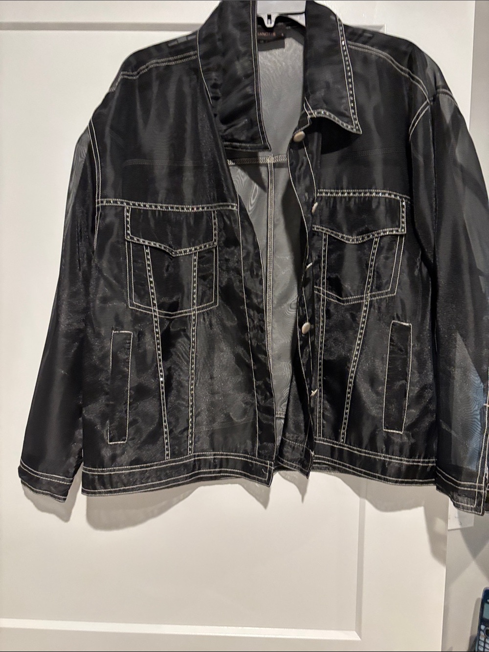 Beautiful black sheer
Jacket with small rhinestone sewn on